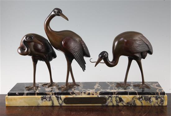 Irenee Rochard. A French Art Deco bronzed spelter group of three ibises, 19.5in.